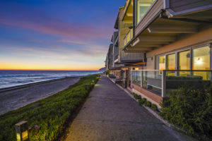 walkway at sunset outside of malibu bay club home for sale