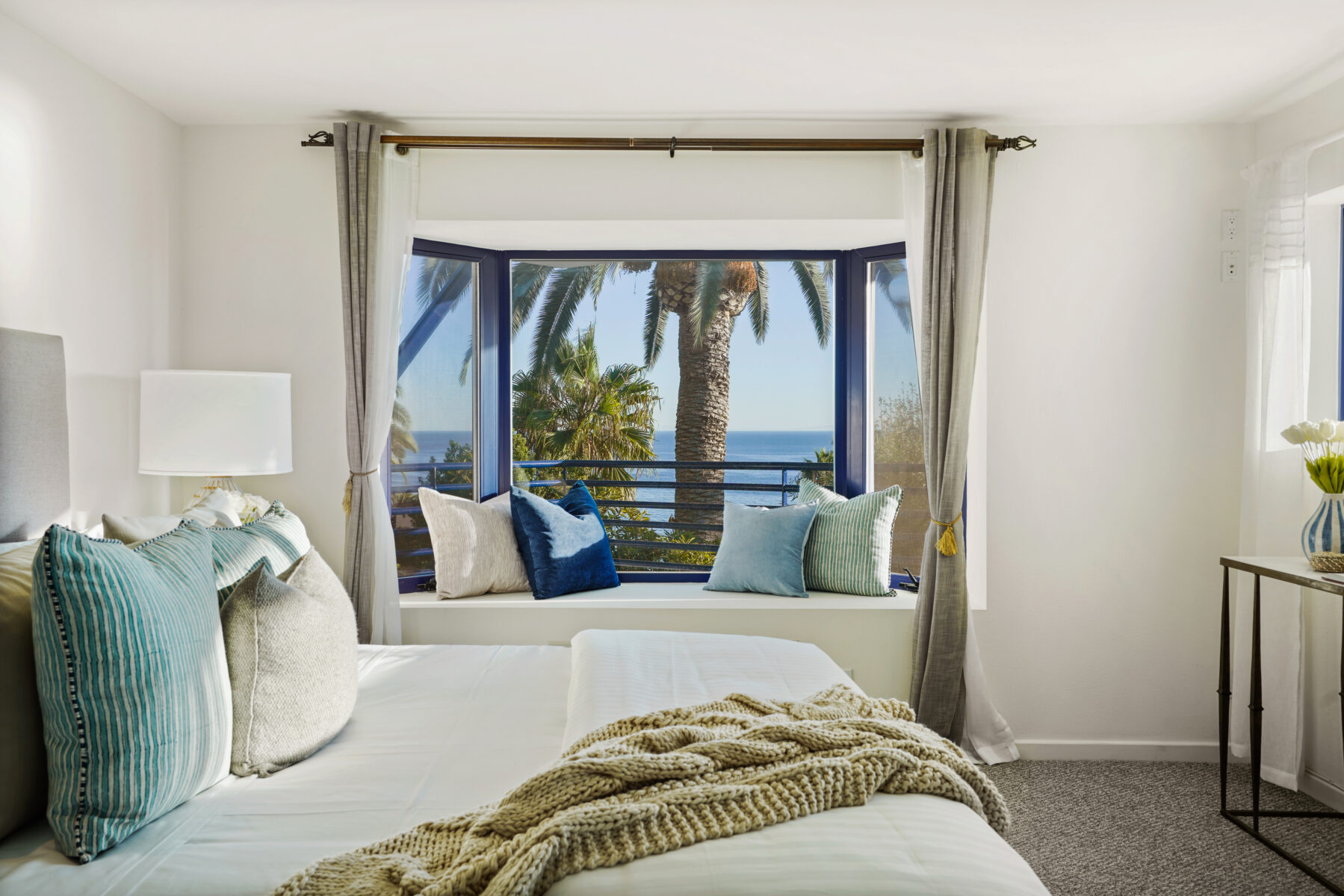 master bedroom with reading nook and ocean views in la costa beach malibu